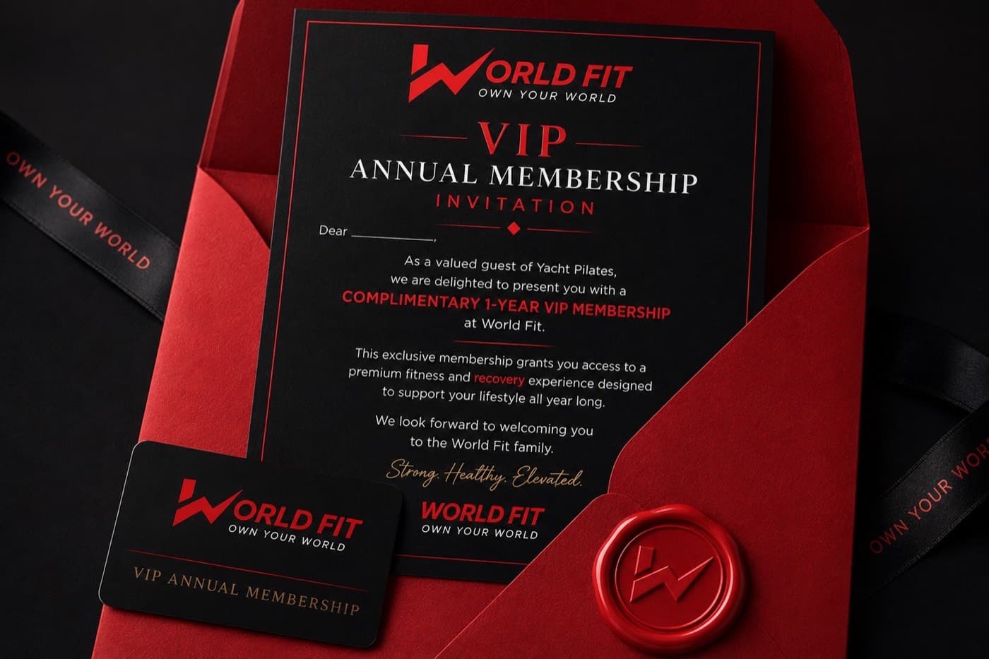 The World Fit VIP annual membership invitation and card on a red envelope
